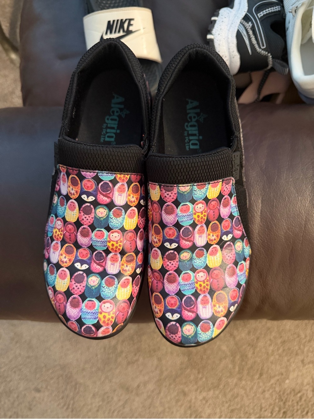 Alegria Kids Slip-On Sneakers in Black with Bright Multicolor Nesting Doll Print